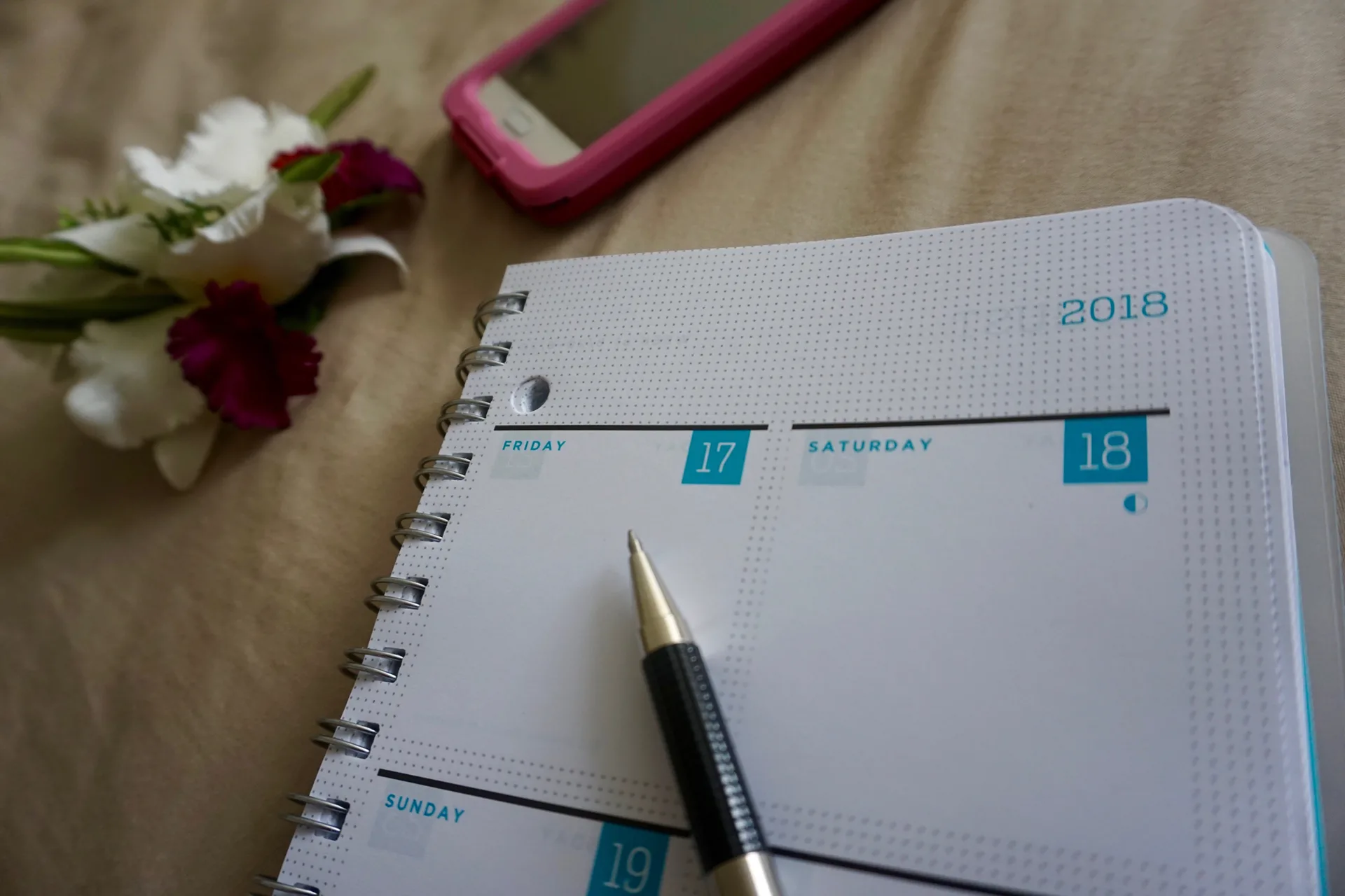 open-calendar-with-a-pen-lying-on-top-2026-03-09-22-34-09-utc